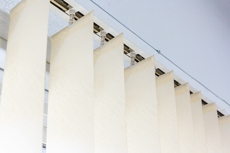 white vertical blinds