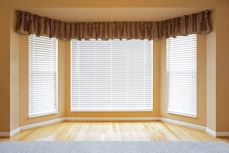 bay window with blinds